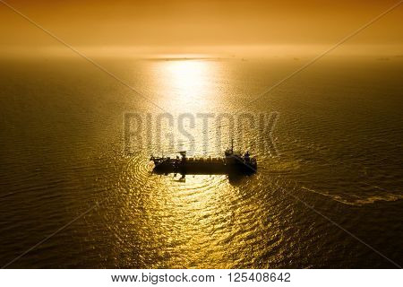 Night view of the ship in the Atlantic ocean in moonlight pathway