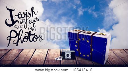 camera against blue sky with white clouds