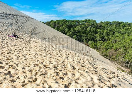 People Visiting The Highest Sand Dune Of Pyla In Europe