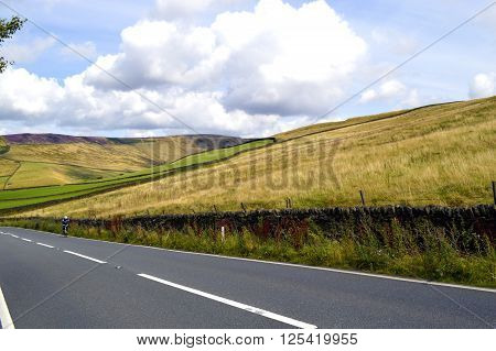 A cyclist in Glossop Derbyshire England UK