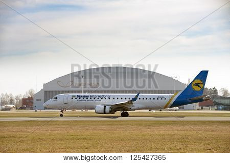 RIGA, LATVIA - APRIL 4, 2016: Ukrane Airlines Boeing 737-800 landed at Riga International Airport, Latvia