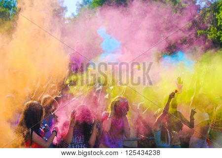 Vitebsk, Belarus - July 4, 2015: Throwing color at the Holi color festival