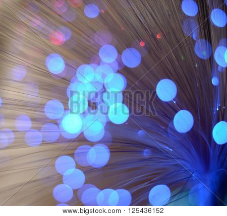 Blurred abstract pink and blue bokeh lights. Christmas holiday defocused background. Backdrop for your design