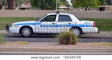 SCOTTSDALE ARIZONA APRIL 23 2014: Police car of Scottsdale  is a city in the eastern part of Maricopa County, Arizona, adjacent to the Greater Phoenix Area.