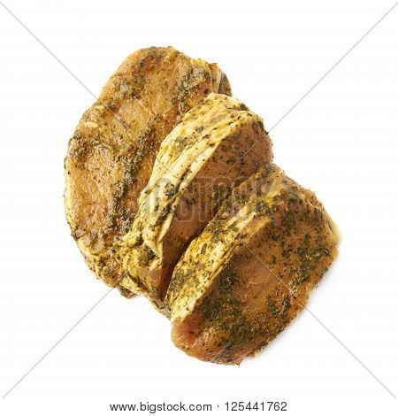 Three marinated with herbs beef slices isolated over the white background