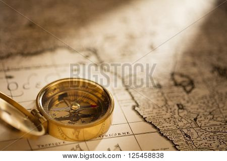 Compass on vintage map