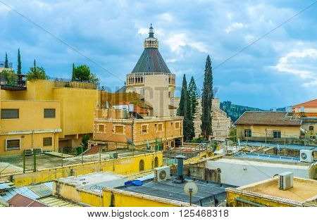 The view on Basalica of Annunciation through the roofs of Nazareth Israel.