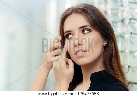 Woman with Cosmetic Colored in Optical Store