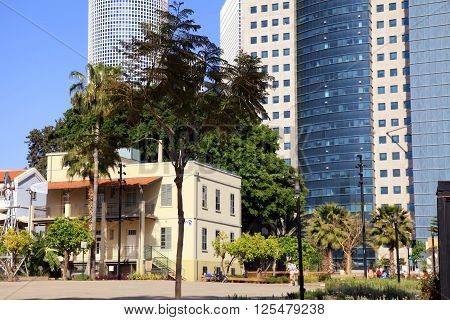 TEL AVIV, ISRAEL - APRIL 7, 2016 : Modern open air commercial center Sarona over skyscrapers of Azrieli Center in Tel Aviv, Israel. Recently open Sarona Market became the most popular place in Tel Aviv.