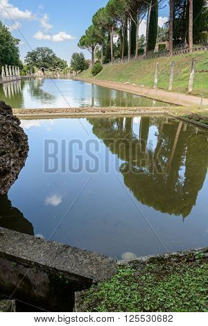 Ancient ruins of Villa Adriana(Canopus canal pool surrounded by columns and statues) Tivoli Italy