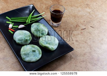 Allium tuberosum. Garlic chives with soy source. Dim sum is chinese cuisine. Dimsum.
