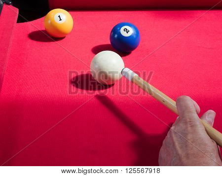 Game of american billiards played on a billiard table for two persons