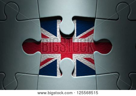 Missing piece from a jigsaw puzzle revealing the British flag