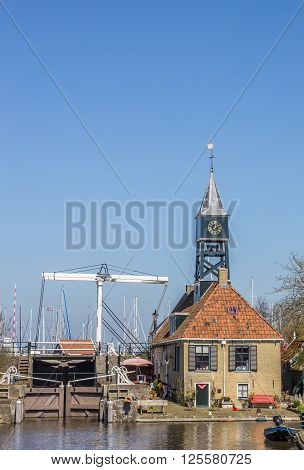 Little lock and lockhouse in historical Hindeloopen Netherlands