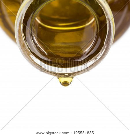 Oil drop on a bottle. Oil pouring from a bottle
