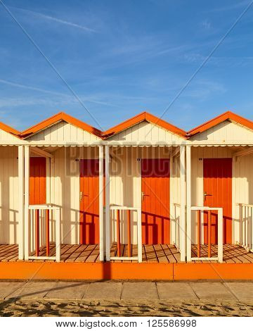 Versilia beach cabins on a sunset moment