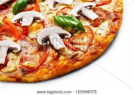 Delicious spicy pizza background - with mushrooms, peppers, ham, cherry tomatoes and pepperoni - thin pastry crust piece, closeup at white background, isolated.