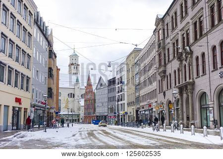Augsburg Germany - January 17 2016: Old town street in city of Augsburg during winter time. Augsburg is Germany's third oldest city.