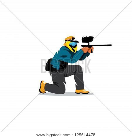 A man with a paintball gun in his hand and a protective mask on his head at the ready to fire.