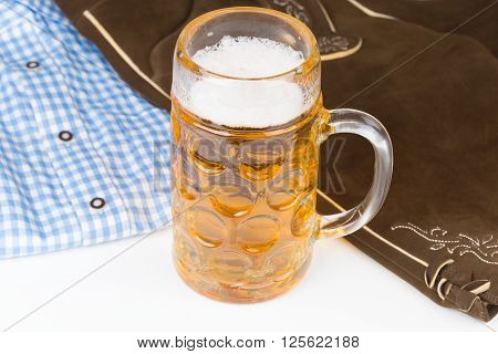 traditional Bavarian pants deerskin and a mug of beer