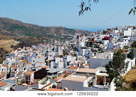 View over town rooftops looking South towards the Mediterranean sea Torrox Malaga Province Andalucia Spain Western Europe.