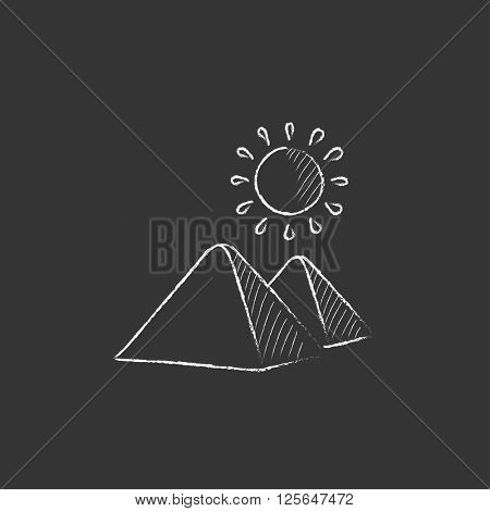 Egyptian pyramids. Drawn in chalk icon.
