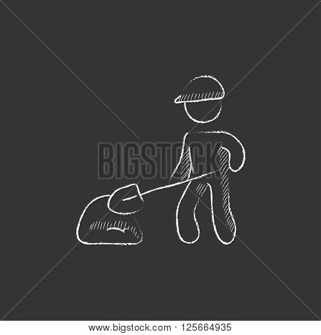 Man with shovel and hill of sand. Drawn in chalk icon.