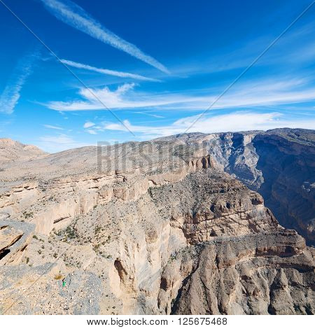 In Oman  The Old Mountain Gorge And Canyon The Deep Cloudy  Sky