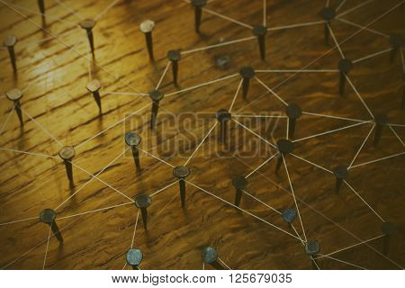 Rustic Nails In Wood Linked By Cotton