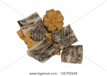 Beautiful and natural handmade cosmetics soaps on a white background.