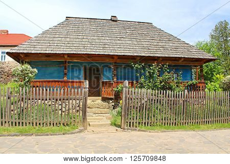 Old wooden house in museum of Folk Architecture in Uzhhorod, Ukraine