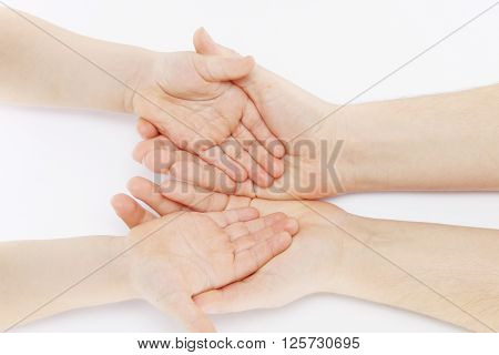 warm mother's hand hold children's gentle hands in his hands