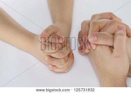 hands child and adult mothers or stacked opposite each other.