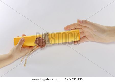 hands child transfer letter other hand adult mothers