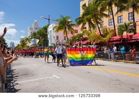 MIAMI BEACH, FLORIDA, APR 2016: The 8th Annual Miami Beach Gay Pride Parade, along Ocean Drive in Miami Beach, Florida. Lesbian, gay, bi, and transgender celebrate diversity. Editorial image only.