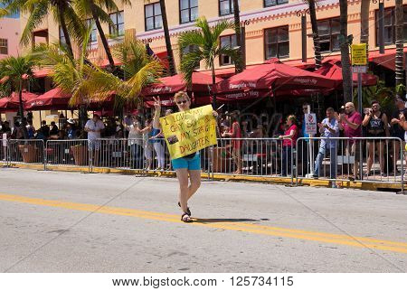 MIAMI BEACH, FLORIDA, APR 2016: The 8th Annual Miami Beach Gay Pride Parade, along Ocean Drive in Miami Beach, Florida. Lesbian, gay, bi, and transgender celebrate diversity. Editorial image only.