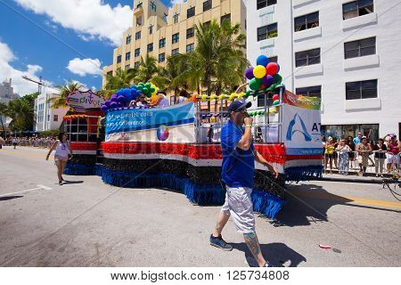 MIAMI BEACH, FLORIDA, APR 2016: The 8th Annual Miami Beach Gay Pride Parade, along Ocean Drive in Miami Beach, Florida. Lesbian, gay, bi, and transgender celebrate diversity. Editorial image only.