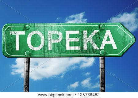 topeka road sign on a blue sky background