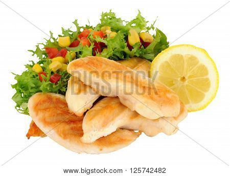 Cooked chicken breast fillets with salad and lemon isolated on a white background