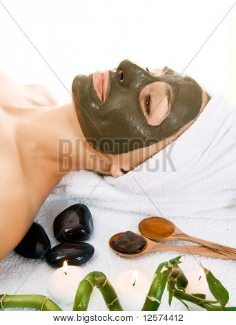Spa.Mud maska na twarzy.Na białym tle