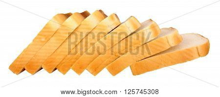 Thickly sliced white processed bread loaf isolated on a white background