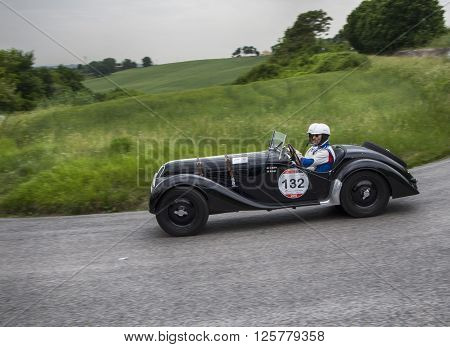 PESARO, ITALY - MAY 15:  BMW 328 1937 on an old racing car in rally Mille Miglia 2015 the famous italian historical race (1927-1957) on May 2015