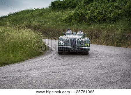 PESARO, ITALY - MAY 15: JAGUAR XK 120 OTS Sports 1950 on an old racing car in rally Mille Miglia 2015 the famous italian historical race (1927-1957) on May 2015