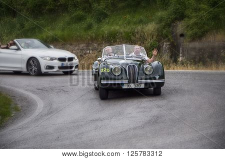 PESARO, ITALY - MAY 15: JAGUAR XK 120 OTS Roadster 1951 on an old racing car in rally Mille Miglia 2015 the famous italian historical race (1927-1957) on May 15 2015