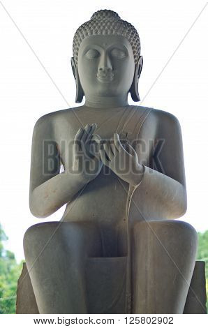 Figurine of the Buddha from bronze on a white background.
