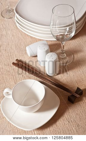 White coffee cups and steel kettle
White coffee cups and steel kettle