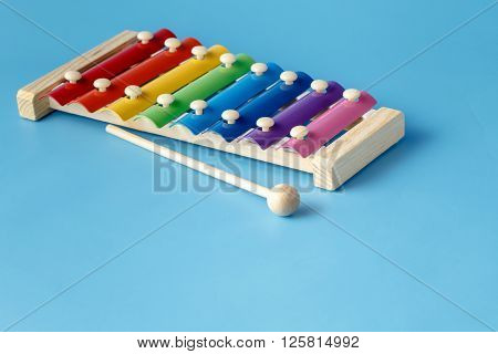 small music xylophone baby percussion instrument on blue background