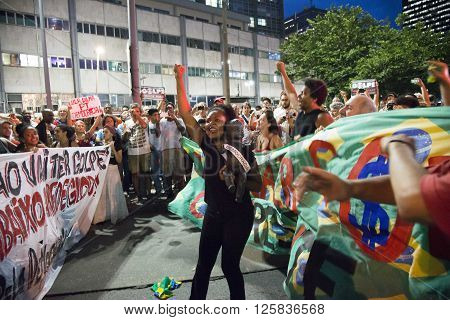 Rio de Janeiro Brasil - March 31 2016: Party workers and social movements are protests in defense of democracy and against the impeachment of President Dilma in the city center in Largo da Carioca