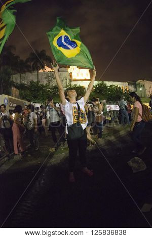Rio de Janeiro Brasil - March 31 2016: Party workers and social movements are protests in defense of democracy and against the impeachment of President Dilma in the city center in Largo da Carioca