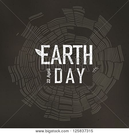 Tree rings and Earth Day logo with date 22 April. 